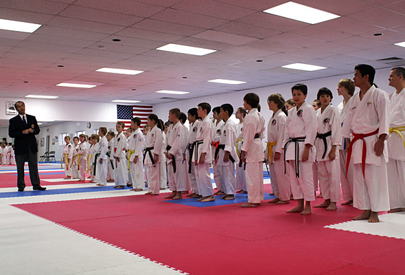 Hanshi Madani talks to students before the start of the Annual IMA Karate Tournament