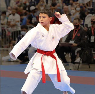 pre-teen in karate stance